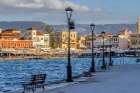 Greece, Crete, Chania, Old Town. View of the Venetian port or harbor, surrounded by cafes. Art Print
